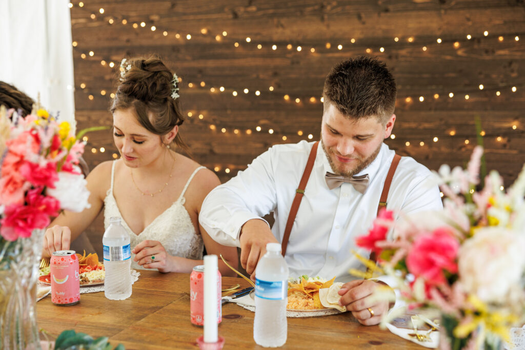 Outdoor wedding venue at Pleasant Pastures Events in Central MN featuring giant oak trees, ponds, outdoor ceremony site, reception tent, concrete dance floor, grain bin bar, garden like setting, rustic outdoor
