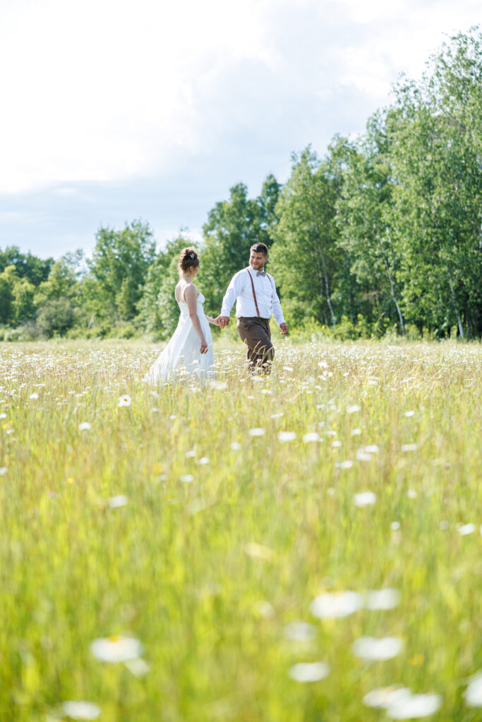 Outdoor Wedding Venue at Pleasant Pastures Events in Central MN featuring pond, oak tree, outdoor ceremony site, reception tent, grain bin bar, for engaged couples