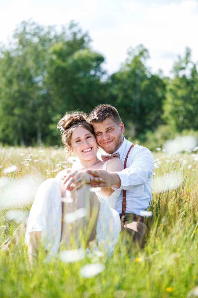 Outdoor Wedding Venue at Pleasant Pastures Events in Central MN featuring pond, oak tree, outdoor ceremony site, reception tent, grain bin bar, for engaged couples