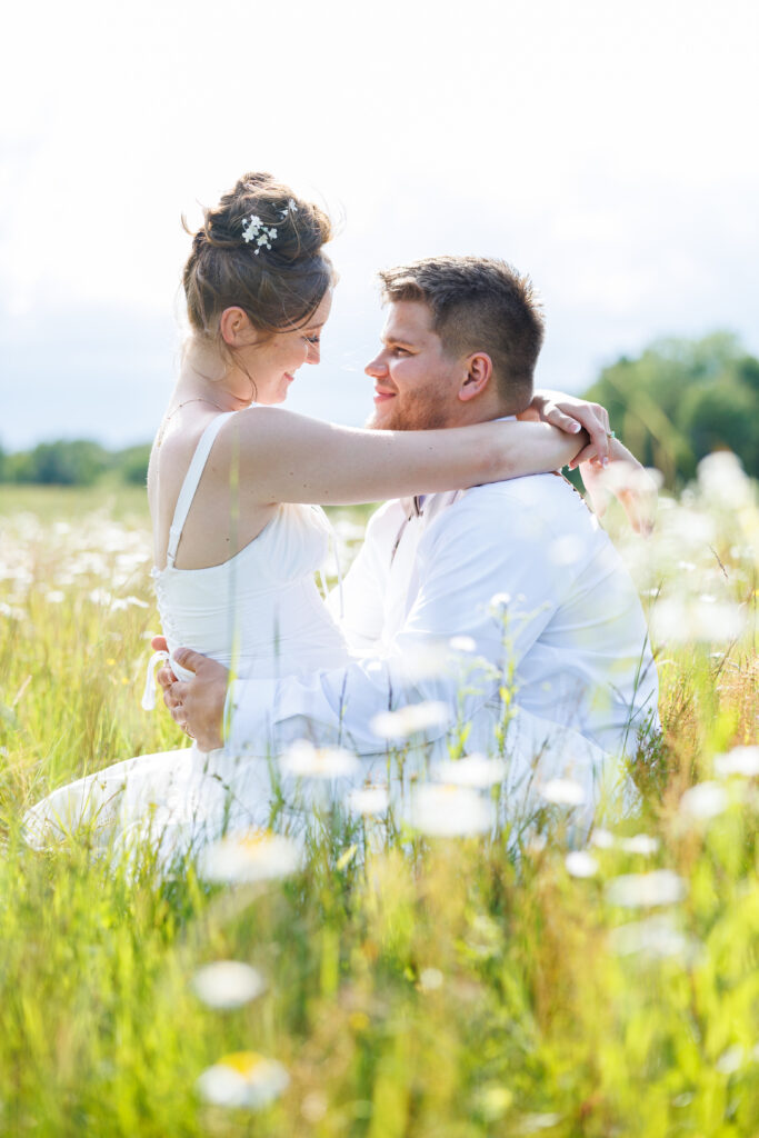 Outdoor Wedding Venue at Pleasant Pastures Events in Central MN featuring pond, oak tree, outdoor ceremony site, reception tent, grain bin bar, for engaged couples