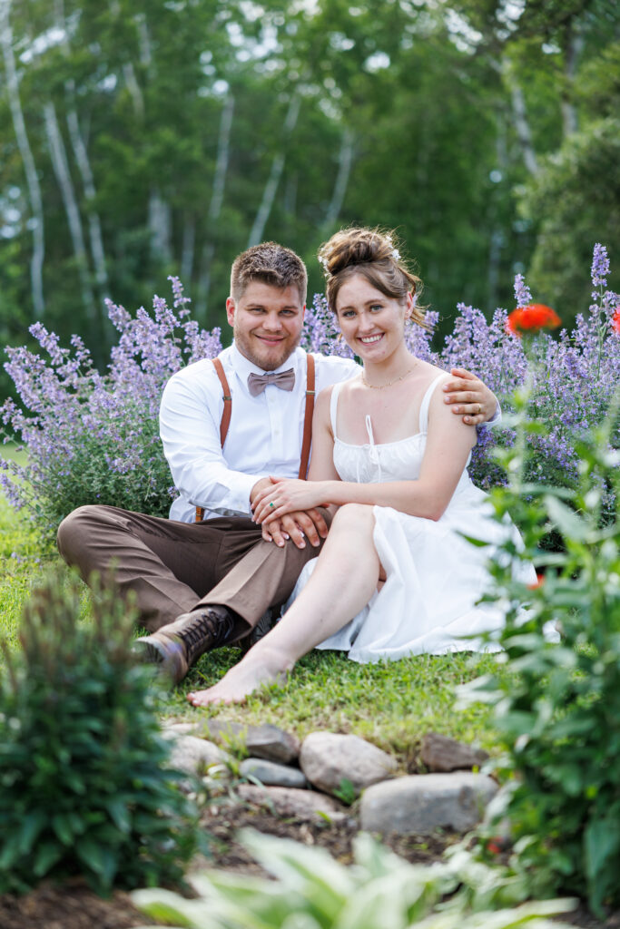 Outdoor Wedding Venue at Pleasant Pastures Events in Central MN featuring pond, oak tree, outdoor ceremony site, reception tent, grain bin bar, for engaged couples